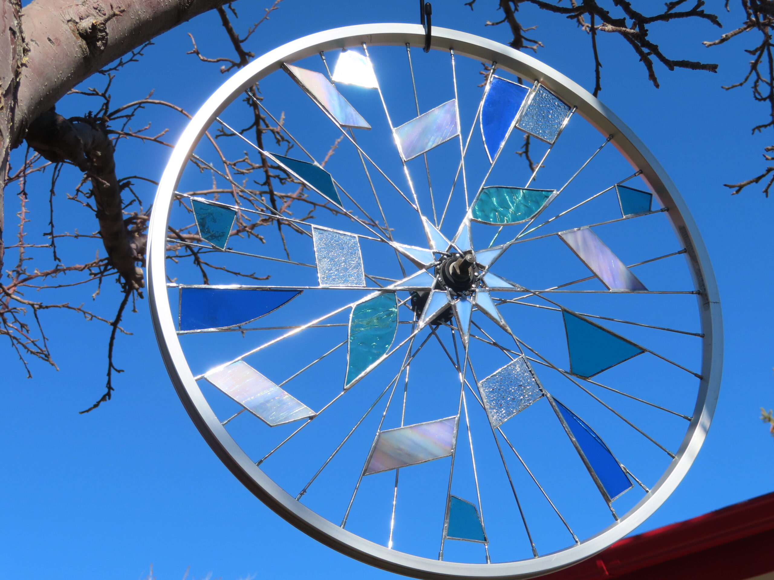 yard art / bike wheel